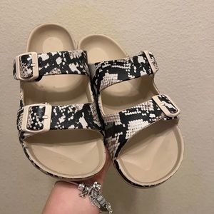 Snakeskin rubber flip flops